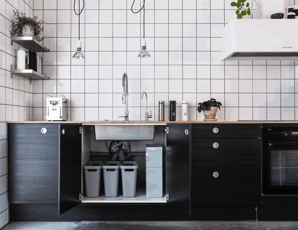 kitchen with recycling bins