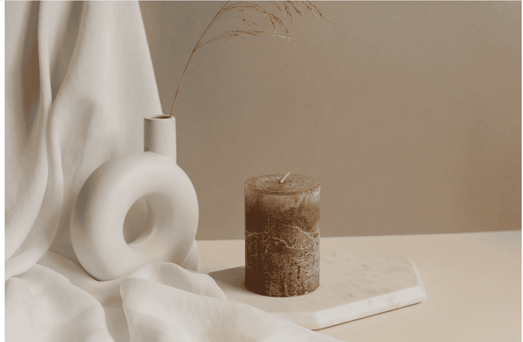 a vase and a candle dfor christian intentional practices