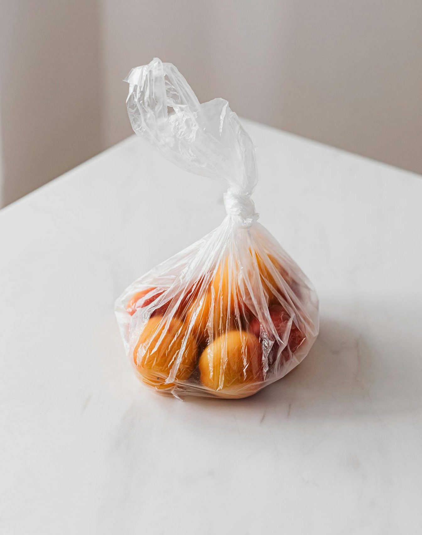 Alternative to most commo plastic items in plastic bag placed on white table